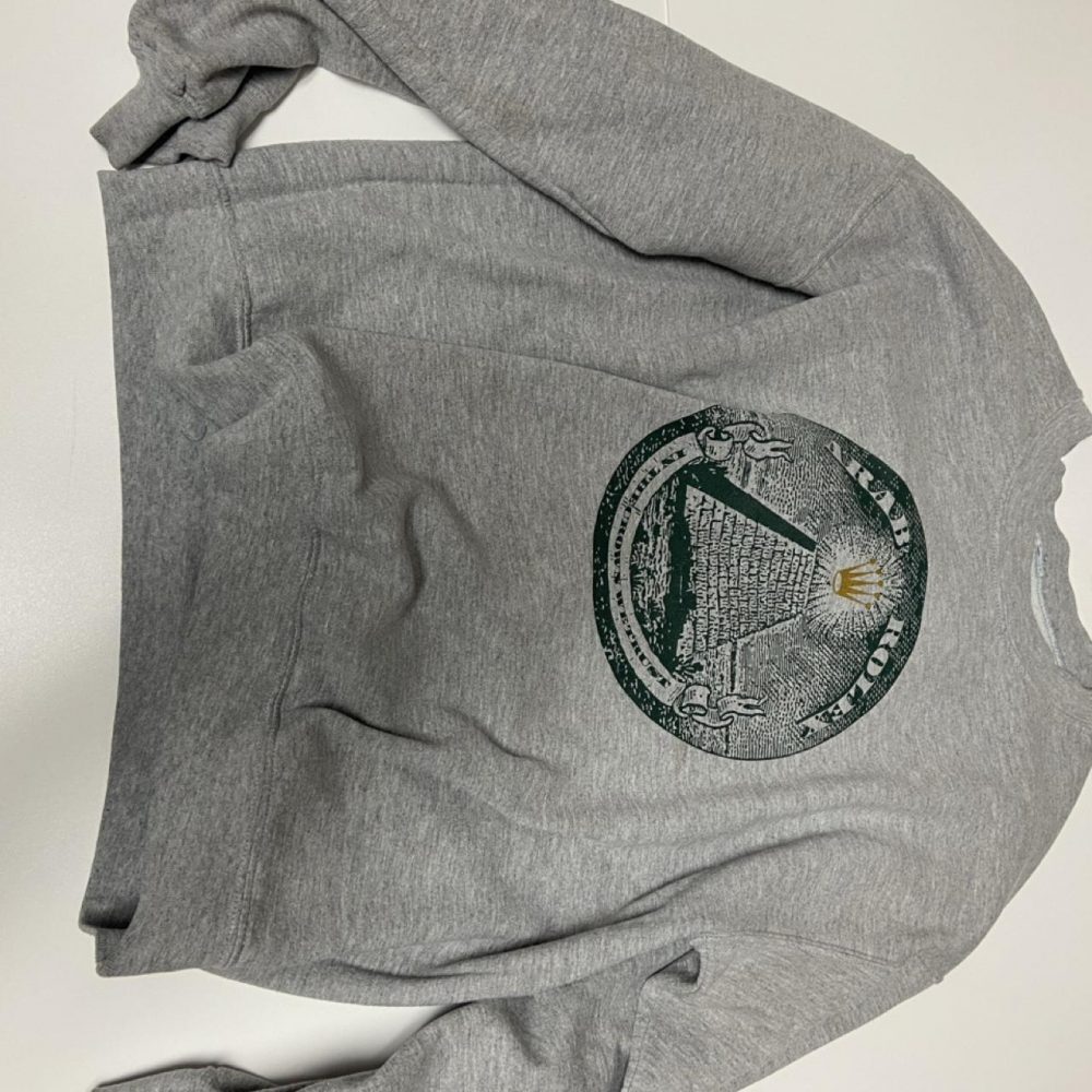 Gray Rolex crewneck sweatshirt with circular logo featuring a crown and text, si
